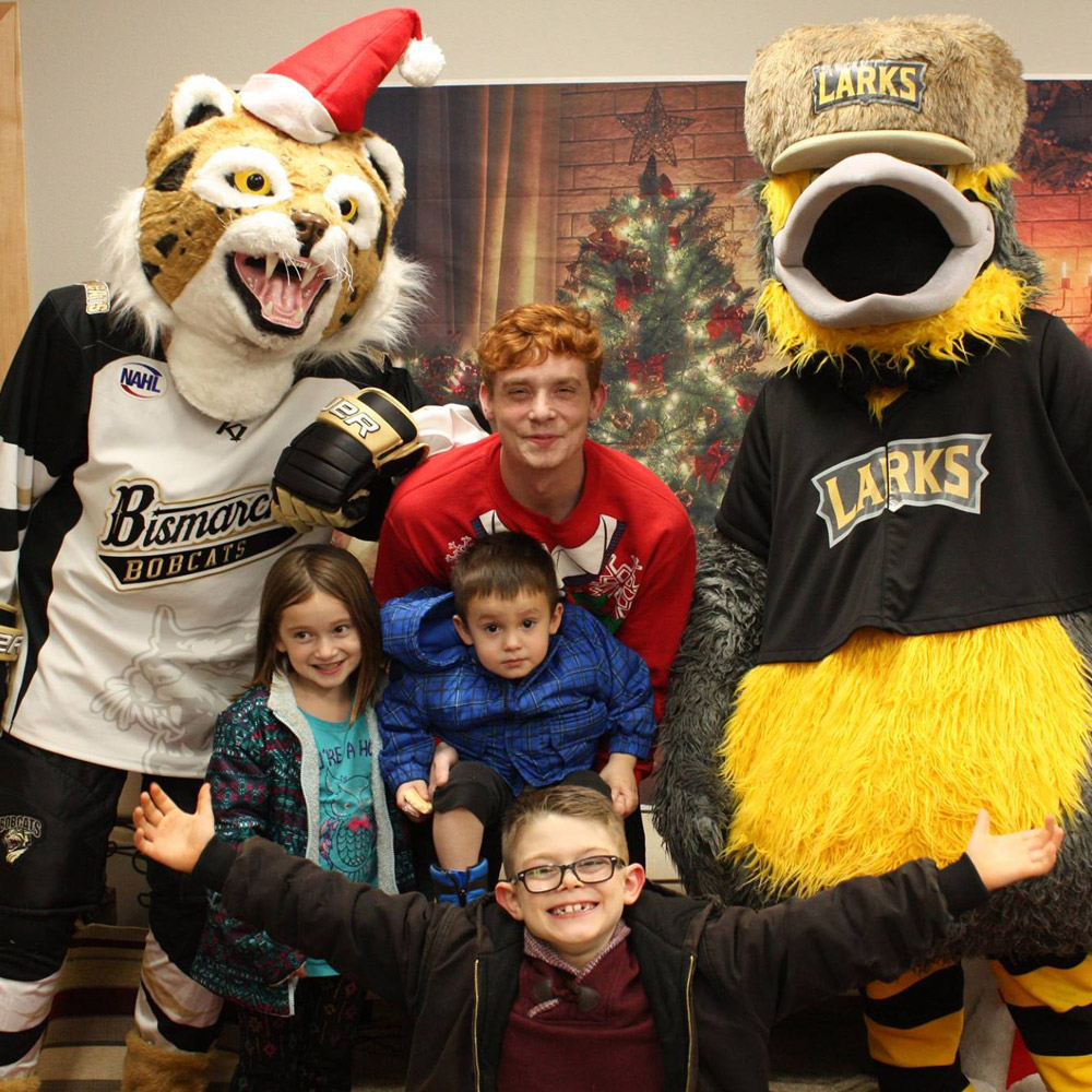 Family with Mascots